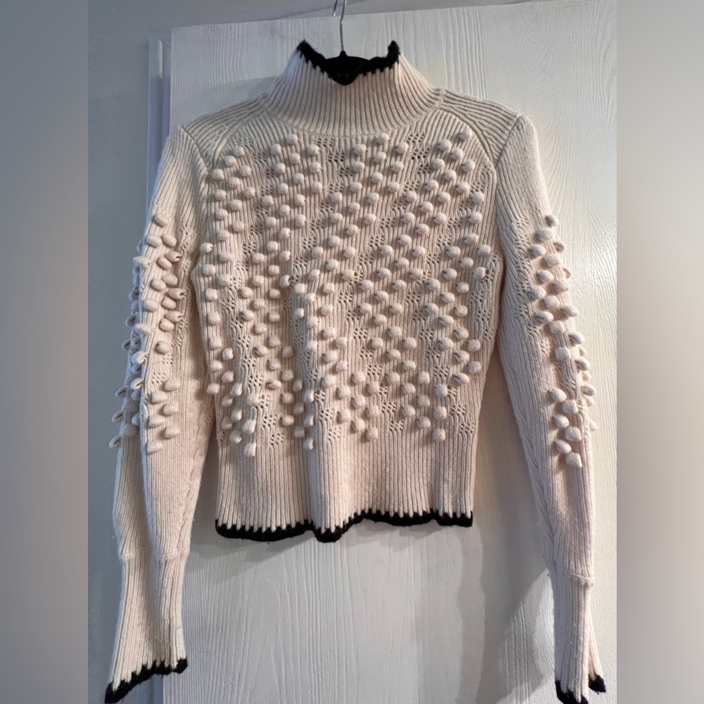 Beautiful short sweater by BCBG